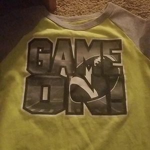 Green game on shirt